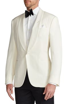 Classic in color, cut and composition, this cream-hued dinner jacket sets a polished course, tailored with a shawl collar and welt pockets from wool barathea. 30" length (size 40R) One-button closure Shawl collar Nonfunctional four-button cuffs Chest welt pocket; front welt pockets Side vents Cupro lining 100% wool Dry clean Made in Italy Men's Designer Clothing Elegant Sport Coat With Single Button And Lapel Collar, Elegant Single Button Sport Coat With Lapel Collar, Timeless Lapel Collar Outerwear For Wedding, Elegant Beige Tuxedo With Notch Lapel, Luxury Cream Blazer With Hidden Button Closure, Luxury Beige Tuxedo For Semi-formal Occasions, White Silk Blazer For Wedding, White Silk Wedding Blazer, Luxury Cream Blazer With Lapel Collar