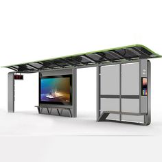 an outdoor kiosk with solar panels on the roof and televisions in it