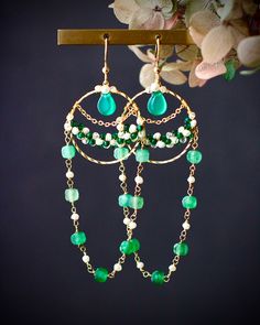 Made to order. Every item will come in a jewelry pouch for safety during travel and gift giving. These dangle earrings are handmade with all natural high quality and well selected gemstones. They are lightweight and comfortable to wear. All materials used are nickel free, friendly to sensitive skin.  🌷MEASUREMENTS Length: 8 cm including ear-wire Width: 2.5 cm 🌷GEMSTONE  🔹Emerald 🔹Green Chalcedony 🔹Green Strawberry Quartz  🔹Shell 🔹Glass Beads 🌷MATERIALS 🔹14K gold filled ear wire, 14K gold filled wrapping wire, 14K gold filled chain 🌷How to take care of my jewelry All handmade jewelry are made with delicate materials that must be handled with care. Please keep your jewelry away with chlorine, perfume, hairspray, soap, lotion or areas with high humidity. Welcome to follow my Instagr Gemstone Bead Earrings, Elegant Boutique, Green Jewellery, Handmade Dangle Earrings, Wire Wrapped Jewelry Diy, Diy Jewelry Earrings, Green Strawberry, Crystal Chandelier Earrings, Interchangeable Jewelry