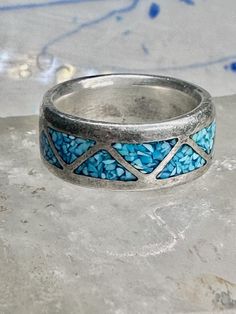 Zuni Wedding ring turquoise wedding band size 6.50 sterling silver women men  Size 6.50 Betwee a size 6.50 and a size 6.75  Weight  7.9g Width  3/8"  Free Shipping & Free Postal Insurance  Delivered in a Gift Box   Free First Class shipping and postal insurance is included. If you want to upgrade to priority kindly pay an additional fee to do so.  This is recommended if you would like to have your package delivered faster than first class which has slowed down Promise Ring In Turquoise Sterling Silver, Adjustable Turquoise Open Ring For Wedding, Stamped 925 Turquoise Ring For Wedding, Turquoise Round Band Ring For Anniversary, Wedding Turquoise Ring Stamped 925, Bohemian Turquoise Ring With Inlay For Anniversary, Silver Southwestern Style Wedding Ring, Bohemian Turquoise Inlay Ring For Anniversary, Southwestern Style Silver Wedding Rings