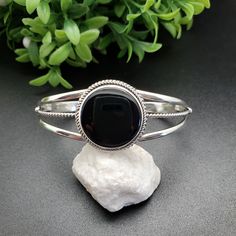 Classic Black Cuff Bracelet Bangle, Classic Black Cuff Bracelet In Bangle Style, Polished Black Bracelets, Black Cuff Bracelet Gift, Black Cuff Bracelet As Gift, Elegant Black Cuff Bracelets, Black Cuff Bracelets For Formal Occasions, Elegant Black Cuff Bracelet, Formal Black Cuff Bracelet With Polished Finish