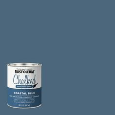 a blue paint can with the words rustfoom chalked on it