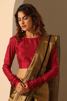 Viva magenta blouse with crafted in pure silk base.
Components: 1
Pattern: Plain
Neckline: Round Neck
Sleeve Type: Full Sleeves
Fabric: Pure Silk
Color: Red
Other Details: 
Model height: 5ft 6inches, wearing size S
Note: The saree worn by the model is not for sale
Occasion: Sangeet - Aza Fashions Magenta Blouse, Women Saree, Viva Magenta, Saree Blouses, Full Sleeves, Not For Sale, Saree Blouse, Aza Fashion, Silk Blouse