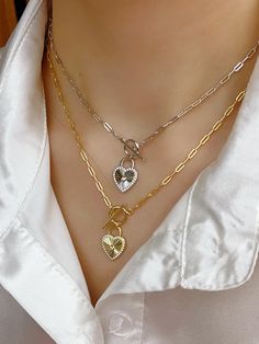 1.Our Heart Shape pendant sparkles as it sits in a halo of cubic zirconia gems. Simple yet elegant, our faux diamond necklace is a classic necklace for every woman; 2.You'll never get tired of seeing the sparkle from all angle! Cubic Zirconia is tougher and will not chip as easily or lose brilliance as fast thus making it a good choice for buyers looking for excellent jewelry at reasonable price; 3.Heart necklaces for women looks great with anything! This charm necklace for women is a lovely sil Cubic Zirconia Heart Necklace Gift For Her, Cubic Zirconia Heart Necklace For Her, Mother's Day Silver Tarnish-resistant Heart Necklace, Valentine's Day Cubic Zirconia Heart Necklace With Clavicle Chain, Valentine's Day Heart Necklace With Cubic Zirconia Clavicle Chain, Plated Jewelry For Valentine's Day Anniversary, Tarnish Resistant Necklace For Valentine's Day, Dainty Silver Plated Charm Necklaces, Gift Heart Necklace With Adjustable Chain And Cubic Zirconia