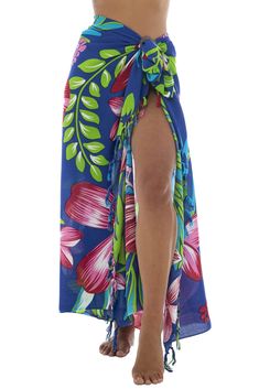 VIBRANT PRINT. Trimmed with boho fringe on two sides, it has a fun tropical look COCONUT SHELL INCLUDED FOR EASY TYING. Generously sized at 67” x 45”, this swimsuit coverup will fit most figures. Sarongs for women are perfect for the beach, poolside, a cruise, backyard party, or dress it up for a summer night out WEAR YOUR SARONG IN A VARIETY OF WAYS! Wear as a bathing suit bikini cover up, a comfortable wrap skirt, sexy pareo dress, sleeveless kimono or as a beautiful shawl. Also makes a fun be Blue Bottoms For Beach Cover-up In Beach Season, Bohemian Floral Print Beach Bottoms, Bohemian Floral Beach Bottoms, Bohemian Swim Bottoms For Beach Season, Blue Hawaiian Style Bottoms For Summer, Blue Hawaiian Summer Bottoms, Hawaiian Style Blue Bottoms For Summer, Bohemian Pool Bottoms For Vacation, Hawaiian Style Blue Summer Bottoms