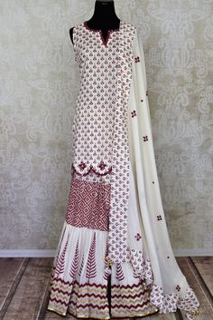 Buy beautiful white Kalamkari cotton sharara suit online in USA with mirror work. Get set to dazzle on festive occasions in this exquisite designer suits, Anarkali dress, sharara suits, salwar suits, palazzo suits from Pure Elegance Indian fashion store in USA.-full view Cotton Sharara Suits, Cotton Sharara, Dress Sharara, Sharara Suits, Sharara Suit, Fashion Journals, Traditional Fabric, Anarkali Dress, Mirror Work