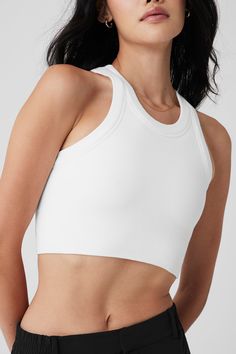 Hello, new favorite tank. The Seamless Delight High Neck Bra has an on-trend high-neck silhouette and soft, smooth feel, so you can wear it from practice to pavement without missing a beat. Pairs well with everything Alo. Studio-to-street superstar On-trend longline silhouette Medium impact — practice-perfect Designed & uniquely fit to flatter every size Wear-tested by our in-house team for the perfect fit Womens Onesie, Men Accesories, High Neck Bra, Tank Top Long Sleeve, Tank Top Bras, Womens Capris, Back Women, Alo Yoga, Bra Women