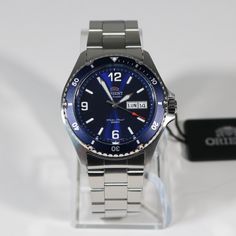 Orient Ray II Men's Blue Dial Stainless Steel Watch FAA02002D9 Item No. FAA02002D9 Stainless Steel Case and Bracelet Blue Dial Screw Down Crown Mineral Crystal Automatic Movement Caliber F6922 Push Button Clasp Unidirectional Bezel Water Resistance: 200 meters Case Diameter: 41mm Case Thickness: 13 mm Analog Display Day Date Display 40 Hour Power Reserve Lug Width: 22 mm Free Priority Shipping on all orders in continental U.S. Shipping time is usually between 2 and 6 day's. 1 day handling time. Blue Watch With Rectangular Dial And Analog Display, Blue Watch With Analog Display And Rectangular Dial, Blue Rectangular Analog Watch, Blue Automatic Chronograph Watch With Rectangular Dial, Blue Automatic Watches With Rectangular Dial, Blue Automatic Watch With Rectangular Dial, Outdoor Watches With Date Display, Round Dial, Blue Analog Chronograph Watch For Outdoor, Outdoor Blue Analog Chronograph Watch