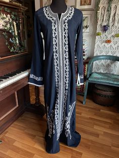 "Beautiful embroidered caftan Maxi length  Size S-M Approximate measurements are taken flat  Armpit to armpit 18\" Waist 18\" Length , front 58\", 59\" in the back. Excellent condition"