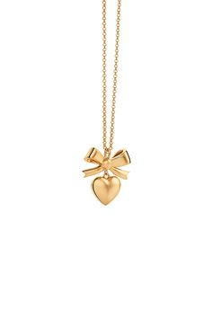 Superlove Bow Necklace Gold Karen Walker’s Superlove Bow Necklace features the brand’s favourite heart, elevated with a Victorian locket profile and delicately suspended from a mini bow.  - Charm Length - 21 mm   - Charm Width - 20 mm   - Necklace Length - 55cm Gold Bow Necklace, Victorian Locket, Bow Charm, Mini Bow, Bow Necklace, Mini Bows, Karen Walker, Necklace Length, Necklace Gold