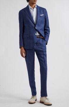 Rich fabric crafted from linen, wool and silk brings soft freshness to a masterfully tailored suit designed to mimic the appearance of pinstriped denim. Jacket has notched lapels; chest welt pocket; front flap pockets Trousers have zip fly with hook-and-bar closure; front slant pockets; back welt pockets Jacket is lined; trousers are lined to the knee 74% linen, 24% wool, 2% silk Dry clean Made in Italy Designer Clothing Rich Fabric, Pocket Jacket, Suit Designs, Blue Suit, Linen Blend, Fabric Crafts, Top Brands, Nordstrom, Trousers