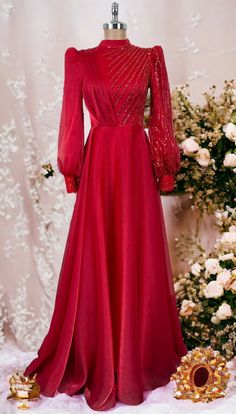 It is made of 100% organza and beaded tulle lace fabric.  The dress is 1000 grams.  It is a lined dress.  Dress length is 155 cm.  Measurements for size 38 are 92 cm bust, 72 cm waist, 96 cm hips Chiffon Long Sleeve Mother Of The Bride Dress, Chiffon Mother Of The Bride Dress With Long Sleeves, Floor-length Organza Gown With Sheer Sleeves, Banquet Gown With Sheer Sleeves And Fitted Bodice, Floor-length Evening Dress With Lace Sleeves For Banquet, Long Sleeve Sequined Tulle Evening Dress, Long Sleeve Evening Dress With Sheer Bodice For Wedding, Sequin Organza Gown For Banquet, Sheer Bodice Long Sleeve Evening Dress For Wedding