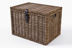 a brown wicker basket with black handles