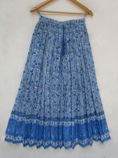 "ITEM DESCRIPTION Indian blue flower printed cotton long maxi skirts - summer season with tassel women long skirts Material: 100% cotton cambric soft crinkled fabric Length: - 38 inch long Waist :-28.00 inch full (14 inch half) 28 inch relaxed can stretch up to 50 inch Size: free size (fit to all) PRODUCT NAME: - Long Women Maxi skirts Ladies Vintage Long skirts Company Return Policy: Please write for more information to my email directly CHOOSE \"ASK SELLER QUESTION \" payment policy:- we accep Long Maxi Skirts Summer, Crinkled Fabric, Maxi Skirts Summer, Indian Blue, Printed Long Skirt, Cotton Maxi Skirts, Skirts Summer, Geometric Prints, Womens Maxi Skirts