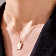 If you have something very special in your mind and want to demonstrate it all the time, our Engravable Pendant, elegantly designed and made with minimalist style, is always here to carry out and reflect your values, with an impeccable pride. - Made in 14k solid gold- Pendant, 17.35x10.25 mm / 0,68x0,40 inches- Thickness, 1.28 mm / 0,05 inches- It can be used with up to 3 mm chains. If you are to use it with a thicker chain, please let us know before you make the purchase. - This product comes w Elegant Engraved Charm Necklace With Rectangular Pendant, Elegant Engraved Charm Necklaces With Rectangular Pendant, Gift Necklace With Polished Finish And Rectangular Pendant, Minimalist Rectangular Necklace With Polished Finish, Elegant Tarnish-resistant Charm Necklace With Rectangular Pendant, Elegant Tarnish Resistant Rectangular Pendant Charm Necklace, Minimalist Rectangular Necklace As Gift For Her, Minimalist Rectangular Necklaces As Gift For Her, Elegant Tarnish-resistant Rectangular Pendant Charm Necklace