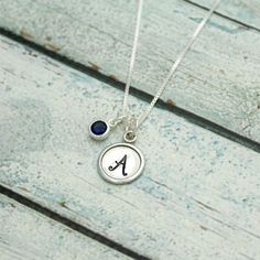 "September Birthstone Initial Necklace, Sapphire Jewelry, September Birthday Gift, September Birthstone Jewelry, Sterling Silver Sapphire, Wax Seal Lovely September Birthstone Garnet Necklace. A classic, sterling silver 3/8\" disc with an initial paired with a 6mm birthstone, beautiful blue sapphire set in sterling silver. Simple and elegant, perfect gift for a September birthday. Available in all birthstones. HOW TO PERSONALIZE: Please add the item to your cart. You can select the size and ston Silver Birthstone Necklace For Personalized Gift, Silver Birthstone Necklace With Round Pendant For Personalized Gift, Sterling Silver Birthstone Necklace For Birthday, Silver Birthstone Necklace For May Birthdays, Silver May Birthstone Necklace For Birthday, Silver Birthstone Necklace With Round Shape For Personalized Gift, Silver Birthstone Necklace For Birthday With Round Pendant, Sterling Silver Initials Charm Necklace For Birthdays, Personalized Sterling Silver Birthstone Necklace For Birthday