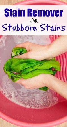 someone is washing asparagus in a pink bowl with the words stain remover for stubborn stains