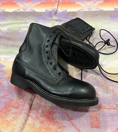 The boots are in excellent, new old stock condition.  Please look over all the pics for measurements and condition and let me know if you have any questions!  We ship one or two days after receiving payment for purchases. Returns are not accepted. Thanks for dropping by. We're glad you found us! Vintage Black Combat Boots With Reinforced Toe, Vintage Steel Toe Work Boots, Vintage Leather Work Boots For Streetwear, Vintage Black Plain Toe Work Boots, Vintage Black Combat Boots With Round Toe, Vintage Combat Boots With Snip Toe And Reinforced Toe, Vintage Leather Combat Boots With Plain Toe, Vintage Leather Combat Boots With Steel Toe, Vintage Leather Combat Boots With Rubber Sole