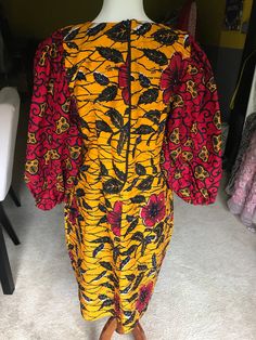 Stoned Ankara Dress. African Wear Size 8-10 Back Zip Side Pockets Bell Sleeves Stoned Front and Back A beautifully shaped dress for an elegant look. Product Information Fabric: 100% Cotton Wash Care: Hand wash separately with a mild detergent. Dress Length: 39.5 Inches Dress sizes US 0, WAIST 25.5, BUST 32.5, HIP 35.5 US 2, WAIST 26.5, BUST 33.5 HIP 36.5 US 4, WAIST 27.5, BUST 34.5, HIP 37.5 US 6, WAIST 28.5, BUST 35.5, HIP 38.5 US 8, WAIST 29.9, BUST 36.5, HIP 39.5 US 10, WAIST 30.5, BUST 37.5, Red Ankara Fabric Party Dress, Long Sleeve Ankara Fabric Party Dresses, Red Ankara Party Dress, Traditional Fitted Midi Dress For Party, Fitted Long Sleeve Ankara Maxi Dress, Elegant Fitted Ankara Midi Dress, Elegant Red Ankara Fabric Dress, Elegant Multicolor Ankara Fabric Maxi Dress, Traditional Long Sleeve Midi Dress For Party