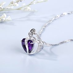 A sparkling tribute to you, this heart necklace is a special look you are certain to adore. Crafted in sterling silver, it features a shimmering purple heart-shaped stone with a open heart-shaped frame. Smaller stones adorns heart frame, adding subtle sparkle. It's a sweet and romantic gift for you or your loved ones.Weight: 4.22 gWidth: 15 mmHeight: 15 mmMaterial: Plating Color: Length: 400 mm Fine Jewelry Heart-shaped Amethyst, Purple Sterling Silver Heart Cut Necklace, Purple Heart Cut Sterling Silver Necklace, Purple Heart-cut Sterling Silver Necklace, Sterling Silver Purple Heart Pendant Necklace, Purple Sterling Silver Heart Pendant Necklace, Purple Heart Cut Jewelry For Valentine's Day, Heart Cut Purple Jewelry For Valentine's Day, Silver Amethyst Jewelry With Heart Charm