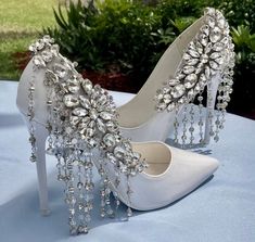 Stunning shoe clips make any ordinary pair of shoes look like they are worth hundreds! The pair of shoe clips attach easily, comfortably and firmly to any pair of shoes. Magic Shoes, Bridal Shoe, Wedding Shoes Bride, Cinderella Shoes, Bridal Heels, Wedding Accessory, Wedding Shoes Heels, Stunning Shoes, Crystal Shoes