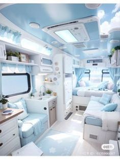 the interior of an rv with blue and white decor