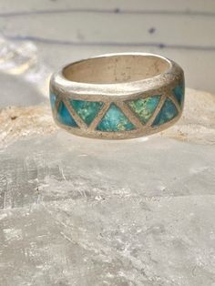 Turquoise ring Zuni wedding band size 4 sterling silver women Size 4 Weight  7.7g Width  1/4" Free Shipping & Free Postal Insurance  Delivered in a Gift Box  Free First Class shipping and postal insurance is included. If you want to upgrade to priority kindly pay an additional fee to do so.  This is recommended if you would like to have your package delivered faster than first class which has slowed down Southwestern Inlay Jewelry For Anniversary, Bohemian Inlay Jewelry For Anniversary, Turquoise Round Band Promise Ring, Southwestern 925 Stamped Jewelry For Anniversary, Stamped 925 Turquoise Ring For Wedding, Turquoise Round Band Ring For Anniversary, Wedding Turquoise Ring Stamped 925, Silver Stackable Turquoise Ring For Anniversary, Turquoise Toe Ring Jewelry For Anniversary