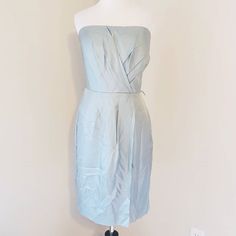 Dusty Blue/Turquoise At Weddings Is Always So Elegant Looking! Brand New With Tags! Banana Republic Dusty Blue Turquoise 100% Silk Strapless Dress Size: 8 Color: Dusty Light Blue/Turquoise Classic Timeless Neckline. Strapless Style With Elegant Pleats. Side Zipper Closure. 100% Silk Retail Price: $169 One More Time, Please Forgive The Wrinkles! I Was Too Excited And Impatient To Wait To Steam It Before Posting! Also Find Us On Facebook For Discounted Prices! Hello Beautiful Resale Boutique Searc Elegant Light Blue Lined Mini Dress, Elegant Light Blue Strapless Dress For Spring, Elegant Light Blue Mini Length Strapless Dress, Elegant Light Blue Mini Strapless Dress, Elegant Light Blue Strapless Mini Dress, Elegant Fitted Light Blue Strapless Dress, Blue Fitted Strapless Dress For Bridesmaid, Blue Fitted Strapless Bridesmaid Dress, Blue Knee-length Strapless Dress For Cocktail