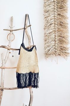 Elegant but still boho bag with tassels. Made beige and black of very unique African palm leave cord Length of bag with tassels 54cm  Just the bag 34cm long Natural Color Bags With Tassels For Vacation, Summer Vacation Straw Bag With Tassels, Natural Color Vacation Bags With Tassels, Tassel Tote Straw Bag For Beach Season, Tote Straw Bag With Tassels For Beach Season, Natural Beach Bag With Tassels For Vacation, Natural Colored Vacation Bag With Tassels, Natural Tassel Beach Bag For Vacation, Vacation Straw Bags With Tassels