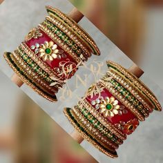 Mesmerizing Combination of Red & Green Color on This Beautiful Chura Set. Decorated With Glass Kundan & Stone Work. Made On Acrylic Base. Make Your Day Most Memorable And Loveable With This Captivating Ensemble. Traditional Bridal Sets With Tilla For Marriage, Heavy Red Traditional Wear For Festive Occasions, Traditional Meenakari Bangle For Marriage, Red Tilla Bridal Sets For Marriage, Red Bridal Sets With Tilla For Marriage, Red Zari Work Bracelet For Diwali, Red Zari Work Bracelets For Festive Season, Red Zari Work Bangle Bracelet, Red Zari Work Bangle Bracelets