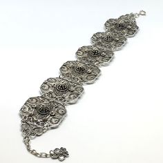 This bracelet is part of our Premium Master Collection. The bracelet was made by one of our family's master jewelers.  The entire bracelet is hand made with filigree techniques used by old filigree masters. The material used is sterling silver (925) and fine sliver (999). Creating this particular bracelet required patience, extensive work, creativity and it is one of the unique pieces amongst all of our collections. This bracelet reminds us of endurance, patience and delicateness. Bracelet Lengt Elegant Metal Chain Bracelet With Intricate Design, Antique Silver Bracelets With Oxidized Finish For Wedding, Wedding Bracelets In Antique Silver With Oxidized Finish, Victorian Oxidized Metal Jewelry, Ornate Antique Silver Nickel-free Jewelry, Victorian Jewelry With Oxidized Metal Finish, Ornate Adjustable Cuff Bracelet With Intricate Design, Silver Oxidized Wedding Bracelets, Adjustable Ornate Cuff Bracelet With Intricate Design