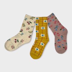 Kids Floral print crews in soft cotton with 3 patterns Sizes: Age 6 - 8 and Age 8 - 12  Cotton 70% + Polyester 27% + Spandex 3% Imported Free Shipping with a $35 purchase Flower Crew, Tabi Socks, Cat Cuddle, Affordable Gifts, Kids Socks, Leg Warmers, Crew Socks, Gender Neutral, Floral Print