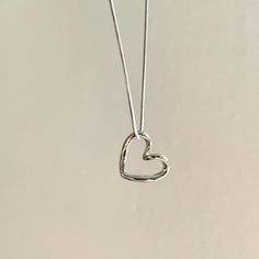 - This simple sweet style necklace is made of stainless steel chain, and stainless steel heart pendant. - Great for bestie necklaces.  - Stainless steel, tarnish free.  - Super simple and dainty, goes well with all your outfits! - length:  15 inches +2 inches of extender chain.  -  -Shipping: All orders will be shipped out within 1-2 business days after the order has been received. Ship from New York, United States. USPS first class mail on this order. 🚗 - Thank you for visiting my listing. - For more cute necklaces: https://www.etsy.com/shop/Funbeadsbygrace1?ref=dashboard-header&section_id=50341900 -  Follow us on Instagram: funbeadsbygrace for more beautiful creations and updates on the shop! Everyday Open Heart Metal Necklace, Everyday Metal Open Heart Necklace, Handmade Heart Charm Necklace For Everyday, Everyday Metal Heart Pendant Charm Necklace, Everyday Metal Charm Necklace With Heart Pendant, Everyday Heart-shaped Nickel-free Necklaces, Everyday Heart Shaped Nickel Free Necklace, Everyday Heart-shaped Nickel-free Necklace, Everyday Nickel-free Heart Shaped Necklaces