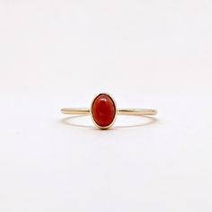 Natural Red Coral Oval Cabochon Gemstone Stackable Ring,.Semi Precious Gemstone Ring in 14k SOLID GOLD For Her from our Capsule Jewelry Collection.  Coral Stone is set in Bezel Setting in our Factory. Gold Ring AAA+ Quality. Perfect Gift For Everyday or Power Birthstone Gift for Your Loved Ones. ►  DIMENSIONS : ◆ Gemstone : Red Coral                       ◆ Stone size : 5*4 mm                           ◆ Gross Weight : 1.200 grams ◆ Shank Width : 1 mm      ◆  Material :  14k Yellow Gold      EAC Elegant Red Gemstone Stackable Rings, 14k Gold Red Cabochon Ruby Ring, Red Cabochon Ruby Ring In 14k Gold, Fine Jewelry Red Birthstone Stackable Rings, Red Birthstone Stackable Rings Fine Jewelry, 14k Gold Rings With Red Cabochon, Elegant Red Stackable Rings With Bezel Setting, 14k Gold Cabochon Red Ring, 14k Gold Red Cabochon Ring