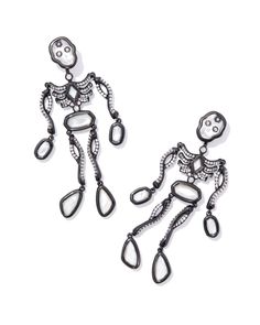 Don’t be spooked—novelty earrings are so on trend! The Skeleton Gunmetal Statement Earrings in Ivory Mother-of-Pearl are the perfect pair for every spooky season fanatic. Adorably arranged in a dangling skeleton shape, these earrings are sure to be the talk of your Halloween party. They’re convertible, too: wear them as a statement or a simple skull stud. Metal Gunmetal Over Brass Material Ivory Mother Of Pearl Closure Ear Post Size 2.86"L X 1.06"WDue to the one-of-a-kind nature of the medium, exact colors and patterns may vary slightly from the image shown. | Kendra Scott Skeleton Gunmetal Statement Earrings in Ivory Mother-of-Pearl | Mother Of Pearl Dainty Jewelry Necklace, Gunmetal Earrings, Simple Skull, Novelty Earrings, Skeleton Earrings, Character Board, Bar Jewelry, Engraved Initials, The Skeleton