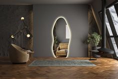 a living room with an oval mirror on the wall next to a couch and chair