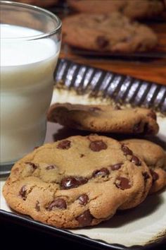 two chocolate chip cookies and a glass of milk