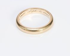 Tiffany & Co. Wedding Band.Vintage 1940's 14K yellow gold wedding band ring by Tiffany & Co. Size: 10. Weight: 6.5 Grams. Yellow Gold Engraved Ring Stamped 14k For Marriage, Vintage 14k Gold Wedding Band With Decorative Designs, Vintage 14k Gold Wedding Band With Decorative Details, Classic Yellow Gold Engraved Ring With Maker's Mark, Vintage Rings With Engraving Option For Anniversary, Classic Engraved Yellow Gold Ring With Maker's Mark, Heirloom Yellow Gold Bands For Anniversary, Heirloom Marriage Band, Vintage 14k Gold Bands