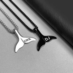 Whale Tail Pendant as a Symbol of Strength and Protection Personalize this charm with your initials or the initials of a loved one. This unique, high-quality handcrafted  ♥ Whale Tail Charm Necklace ♥    the personalized gift for you and your loved one  ♥ Elevate your elegance with our whale tail engraved charm, 22" box chain, and modern font to create a bold, classic look. The necklace is perfect for the everyday. The personalized whale tail necklace symbolizes protection, embodying strength an Personalized Black Metal Necklaces, Personalized Black Jewelry With Name, Personalized Black Name Jewelry, Engraved Stainless Steel Jewelry With Initial Pendant, Personalized Black Stainless Steel Necklaces, Stainless Steel Pendant Necklace For Personalized Gifts, Classic Personalized Stainless Steel Necklaces, Black Personalized Initial Pendant Jewelry, Personalized Black Initial Pendant Jewelry