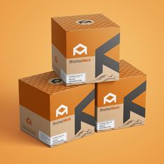 three boxes stacked on top of each other in front of an orange background with mountains