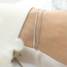 Material: Titanium Steel Style: Personality Elegant Silver Charm Bracelet With Delicate Chain, Delicate Silver Bangle Chain Bracelet, Delicate Silver Metal Chain Bracelet, Elegant Silver Flexible Bracelets, Silver Adjustable Chain Bracelet, Adjustable Silver Bracelet With Delicate Chain, Silver Minimalist Bracelets For Parties, Delicate Silver Chain Bracelet For Party, Elegant Silver Delicate Chain Bracelet