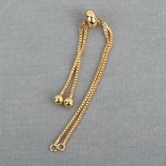 2 Gold Box Chain Slider Bracelet Connector Link Chain, Jump rings on both sides for a charm, one size fits most, fin0735 by SmartParts on Etsy https://www.etsy.com/listing/573043086/2-gold-box-chain-slider-bracelet Slider Bracelet, Gold Box, Box Chain, Adjustable Bracelet, Jump Rings, Both Sides, Link Chain, Jewelry Supplies, Color Trends