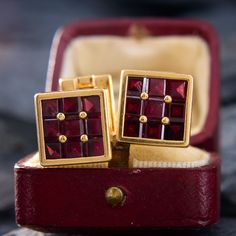 These fantastic square-faced cufflinks hold channel and prong set rhodolite garnets. The garnets have incredibly rich and deep color. They are crafted in 14k yellow gold and stamped Tiffany & Co. Elegant Red Cufflinks For Formal Occasions, Classic Red Cufflinks For Formal Occasions, Art Deco Ruby Jewelry For Formal Occasions, Art Deco Clip-on Jewelry For Formal Occasions, Formal Art Deco Clip-on Jewelry, Clip-on Art Deco Jewelry For Formal Occasions, Luxury Ruby Jewelry With Rectangular Shape, Luxury Ruby Rectangular Jewelry, Luxury Ruby Jewelry In Rectangular Shape