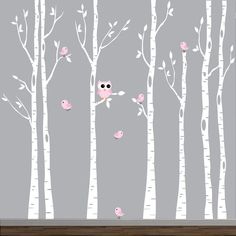 birch tree wall decals with pink birds and white trees in the background on a gray wall