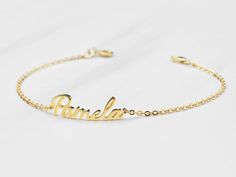 "► CUSTOM NAME BRACELET * Customized with your name in a scripted font, this personalized name bracelet is a lovely wear for any occasion. Available in sterling silver with 18K yellow and rose gold plate options, it is a feminine, elegant gift for your sisters, friends or cousins. * Character limits: 12 characters * BRACELET SIZE : There is no standard size for cuffs/ bangles across different brands so don't just assume that you are certain size. Please check our size guide below carefully befor Custom Name Charm Bracelet For Personalized Gift, Customizable Dainty Name Bracelet For Personalized Gift, Dainty Customizable Name Bracelet For Personalized Gift, Dainty Nameplate Bracelet For Personalized Gift, Customizable Dainty Name Bracelet, Dainty Customizable Name Bracelet, Customized Name Bracelet As Personalized Gift, Nameplate Bracelet With Names As Gift, Customized Nameplate Charm Bracelet For Personalized Gift