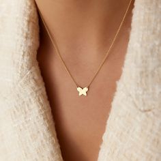 Butterflies have long been regarded as symbols of transformation throughout the world due to their journey from caterpillar to decorative, vibrant butterfly. Whether you've recently gone through your beautiful transformation or you've always just loved butterflies, this minimalist gold butterfly pendant necklace is a stylish addition to your wardrobe.  ▶  Features * Made to Order.  * Gold KT: 14K * Custom Gold Color: Rose Gold, Yellow Gold, White Gold * Charm - 10mm x 8mm * Ready to Ship in 3-5 Business Days ▶ See more of our Gold Bracelets here - http://etsy.me/2l9VKBr ▶ See our storefront here - http://etsy.me/2lUcVnH  ▶ All store sections here * Diamond Rings - http://etsy.me/2lwKUl8 * Diamond Earrings - http://etsy.me/2lyqVBP * Diamond Necklace - http://etsy.me/2mqa6O1 * Diamond Bracel Dainty Yellow Gold Butterfly Pendant Necklace, Yellow Gold Butterfly Charm Jewelry For Everyday, 14k Yellow Gold Butterfly Pendant Necklace, Yellow Gold Jewelry With Butterfly Charm For Everyday, 14k Yellow Gold Necklace With Butterfly Charm, Delicate Yellow Gold Necklace With Butterfly Charm, Everyday Yellow Gold Jewelry With Butterfly Charm, Elegant Butterfly Charms Jewelry, Dainty 14k Gold Butterfly Jewelry