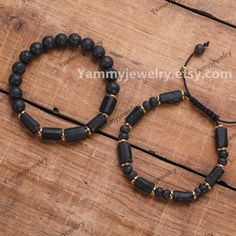 Material : Black Tourmaline  &  Lava Stone . Length: About 7.5inches(19cm) .   Quantity: 1 Pc . They make a great everyday Bracelet that can be worn on its own, or layered with other Bracelet ! These add the perfect touch for any boho look. Crystsal stone are meaningful,can bring health and happiness,it is the best gifts for you or family and friend in any occasion! PRODUCTION TIME & SHIPPING - All products are made to order here at Yammy Jewelry! - If you need express shipping, there will be op Black Spiritual Beaded Bracelets As Gift, Spiritual Black Beaded Bracelets As Gift, Black Crystal Bracelet With Beads As Gift, Black Beaded Crystal Bracelet Gift, Black Spiritual Crystal Bracelet As Gift, Spiritual Black Crystal Bracelet Gift, Spiritual Black Crystal Bracelet As A Gift, Black Gemstone Beaded Bracelets As Gift, Black Crystal Bracelet With Gemstone Beads As Gift