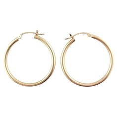 14 Karat Yellow Gold Hoop Earrings- These classic gold hoops are a timeless addition to your collection. Size: 29.8 mm x 2.3 mm x 2.4 mm. Stamped: 14K Weight: 1.0 dwt./ 1.6 gr. Very good condition, professionally polished. Will come packaged in a gift box or pouch (when possible) and will be shipped U.S. Priority Mail Insured. AD0223202417KCS Classic 14k Stamped Hoop Earrings, Hypoallergenic Hoop Earrings For Formal Occasions, Classic Round Hypoallergenic Hoop Earrings, Classic Hypoallergenic Round Hoop Earrings, Classic Hypoallergenic Hoop Earrings, Classic Hoop Earrings As Gift, Classic Round Hoop Earrings For Everyday, Classic Round Hypoallergenic Huggie Earrings, Classic Gold Hoop Huggie Earrings