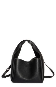 Sculpted from grained leather in a cube silhouette, this bucket bag offers plenty of room for the everyday essentials while retaining a lightweight feel. Carry the versatile look by the folded handle or attach the adjustable strap for shoulder wear. Bridge-clip closure Top carry handle; removable, adjustable shoulder strap Interior wall pocket; card slot Leather Made in Italy Designer Handbags Pocket Card, Rollerball Perfume, Woman Bags Handbags, Platform Slippers, Leather Bucket Bag, Leather Bucket, Maternity Shops, Fragrance Design, Fabric Gift Bags