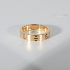 This is part of Chairish’s Fine Jewelry assortment.  Cartier Love Diamond Wedding Band With 1 Diamond in 18K Yellow Gold 0.02 CTW  PRIMARY DETAILS  SKU: 132486  Listing Title: Cartier Love Diamond Wedding Band With 1 Diamond in 18K Yellow Gold 0.02 CTW  Condition Description: Cartier's Love collection is the epitome of iconic, from the recognizable designs to the history behind the line-up. The collection started in 1969 with the bangle bracelet, which is engraved with a circular motif throughou Cartier Love Collection, Jewellery Wishlist, Cartier Love, Diamond Wedding Band, Diamond Wedding Bands, Diamond Wedding, Bangle Bracelet, Cartier, Ring Shopping